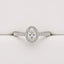 0.44ct Oval Diamond Halo Engagement Ring in 18ct White Gold