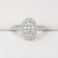 1.00ct Oval Cut Lab Grown Diamond Halo Ring with Diamond Band in 18ct White Gold