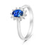 Oval cut blue sapphire and diamond halo ring in 18ct white gold