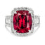 Rubellite and diamond halo ring with baguette accents