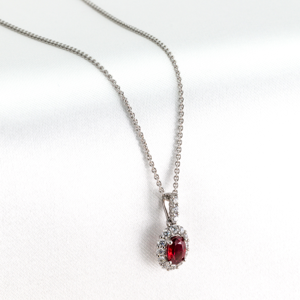 Oval ruby and diamond pendant
